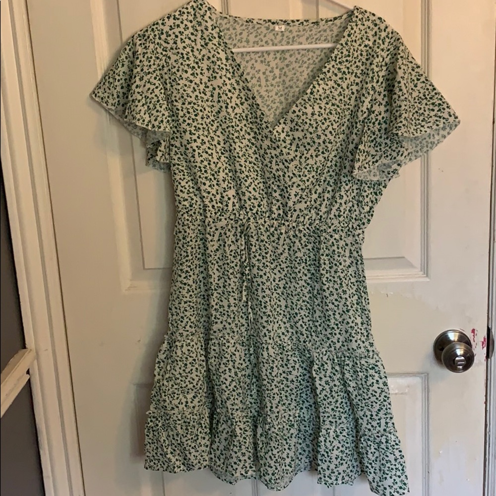 Green and white flower dress.